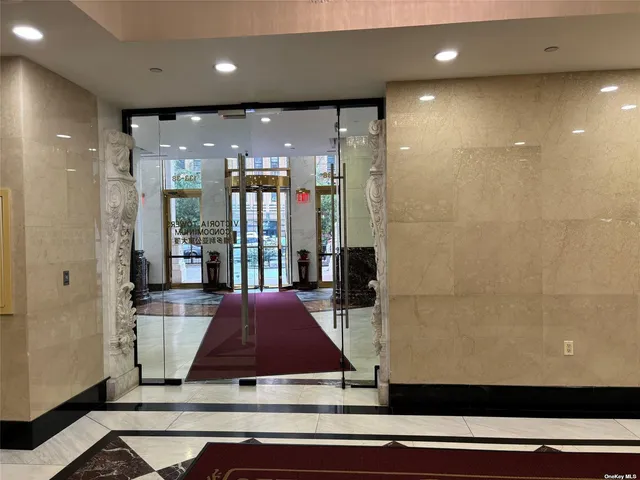 a view of living room with a large window