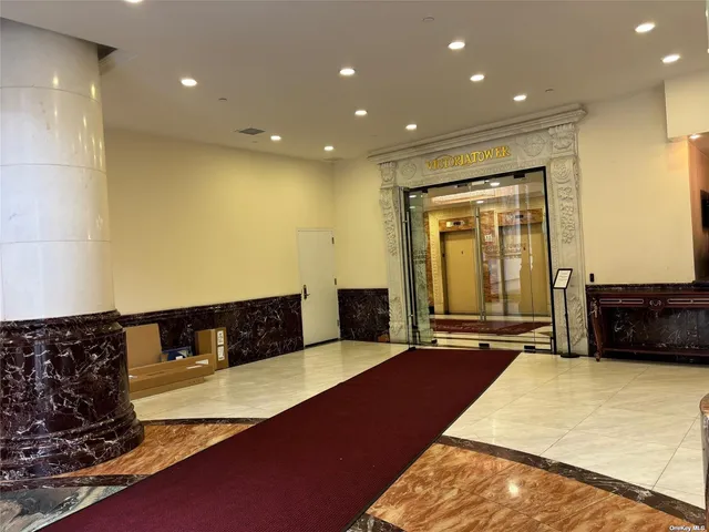a living room with a couch and a flat screen tv