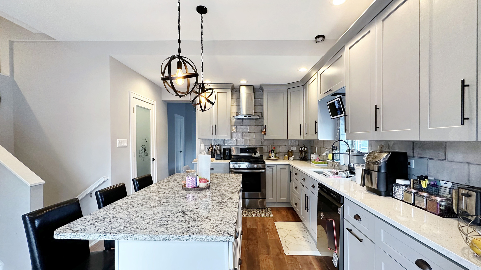 8211 43rd Place Lyons, IL 60534 - Photo 14 of 29 a kitchen with a center island appliances and cabinets