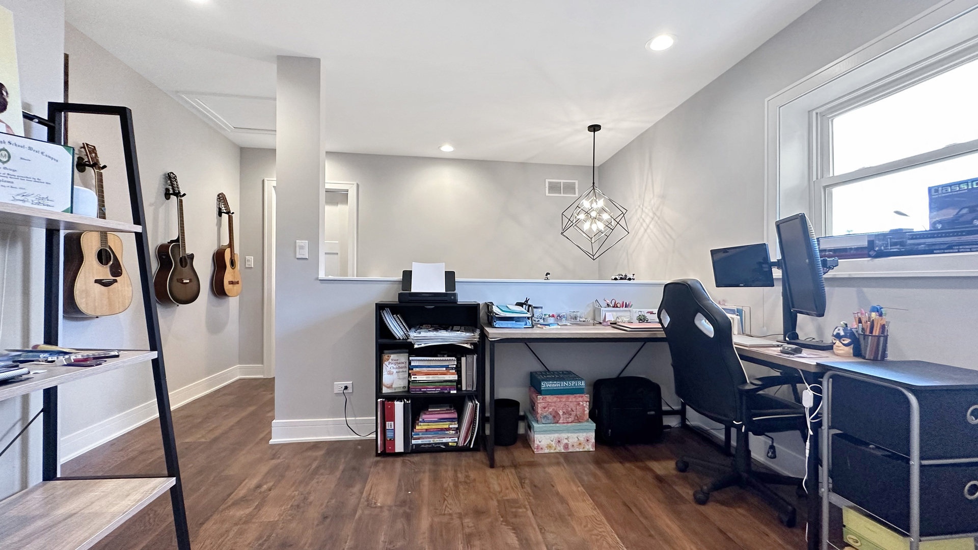 8211 43rd Place Lyons, IL 60534 - Photo 16 of 29 a view of a workspace with furniture and a window
