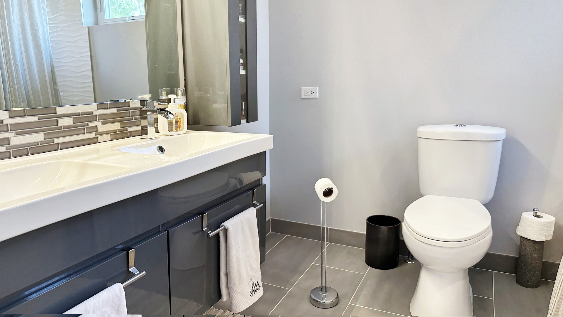 8211 43rd Place Lyons, IL 60534 - Photo 25 of 29 a bathroom with a sink and a toilet