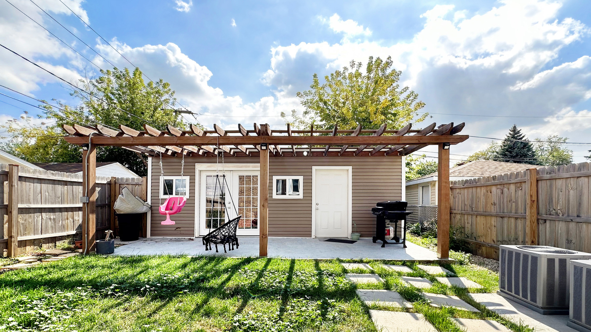 8211 43rd Place Lyons, IL 60534 - Photo 27 of 29 a view of a backyard with a patio