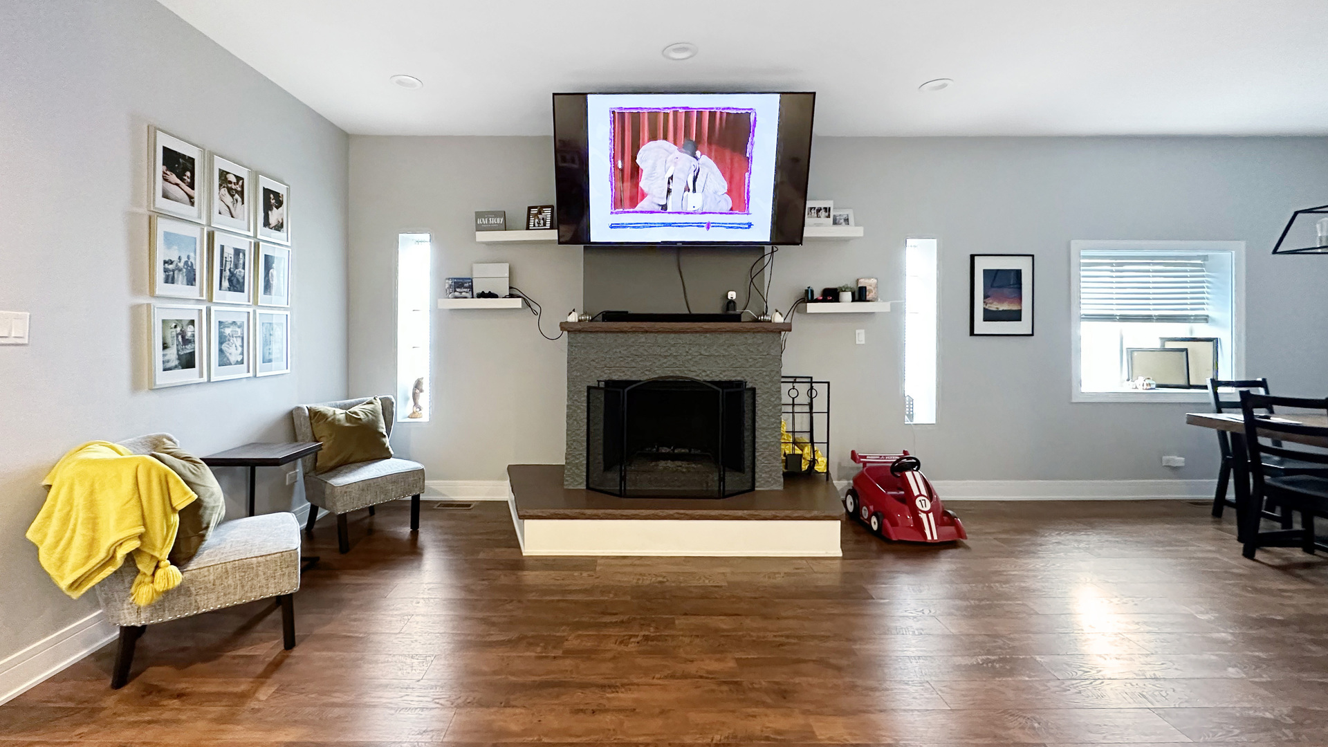 8211 43rd Place Lyons, IL 60534 - Photo 7 of 29 a living room with furniture and a fireplace