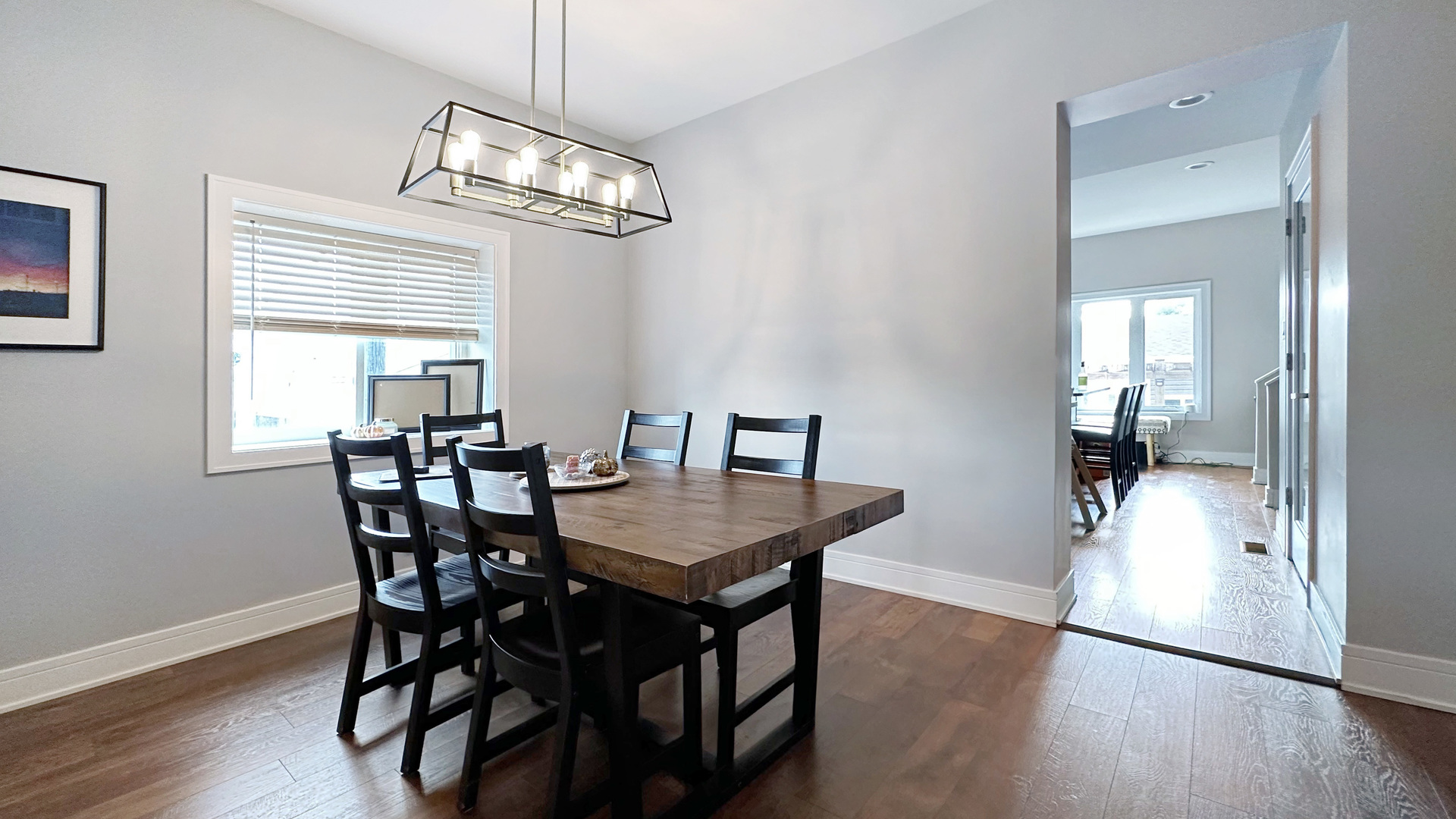 8211 43rd Place Lyons, IL 60534 - Photo 8 of 29 a view of a dining room with furniture wooden floor and a chandelier