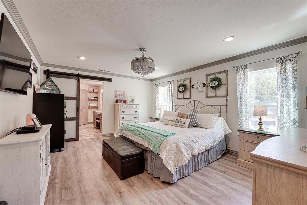 521 Bakers Branch Road Waxahachie, TX 75167 - Photo 19 of 37 Spacious interior featuring wood-finish flooring, recessed lighting, and a crystal chandelier
