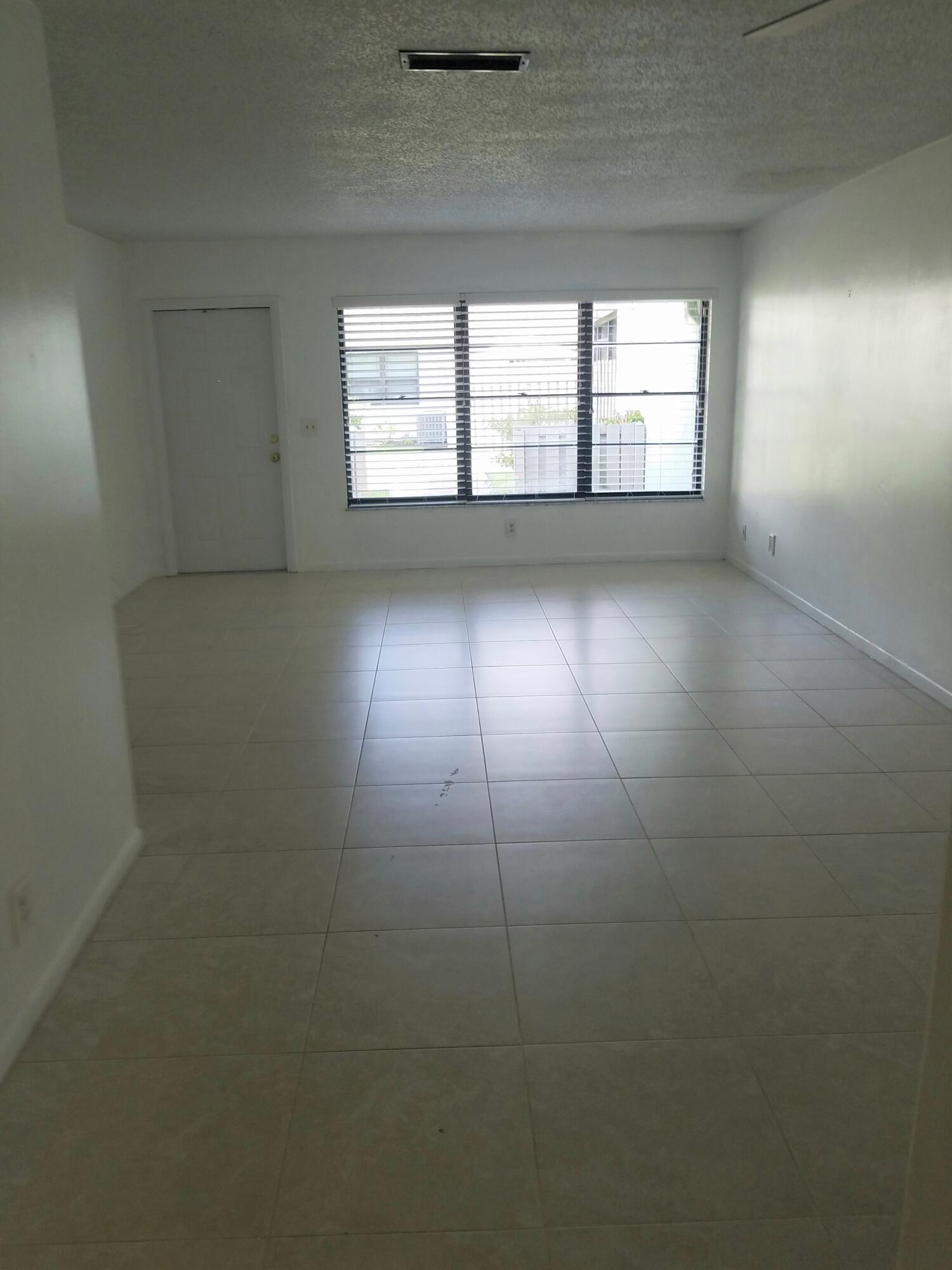 431 Jupiter Lakes Boulevard, Unit 2104B Jupiter, FL 33458 - Photo 3 of 15 Liv-din Rm