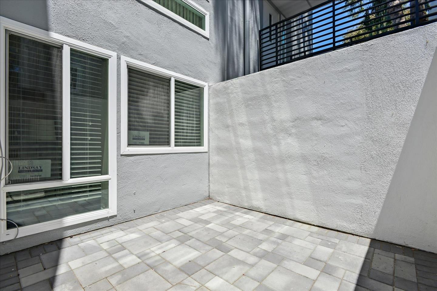 1033 Shell Boulevard, Unit 3 Foster City, CA 94404 - Photo 17 of 33 a view of a backyard of a house