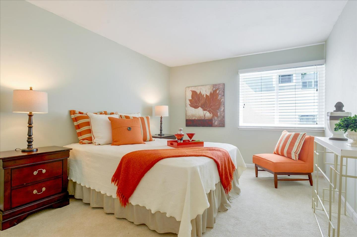 1033 Shell Boulevard, Unit 3 Foster City, CA 94404 - Photo 18 of 33 a bed room with a bed and a couch