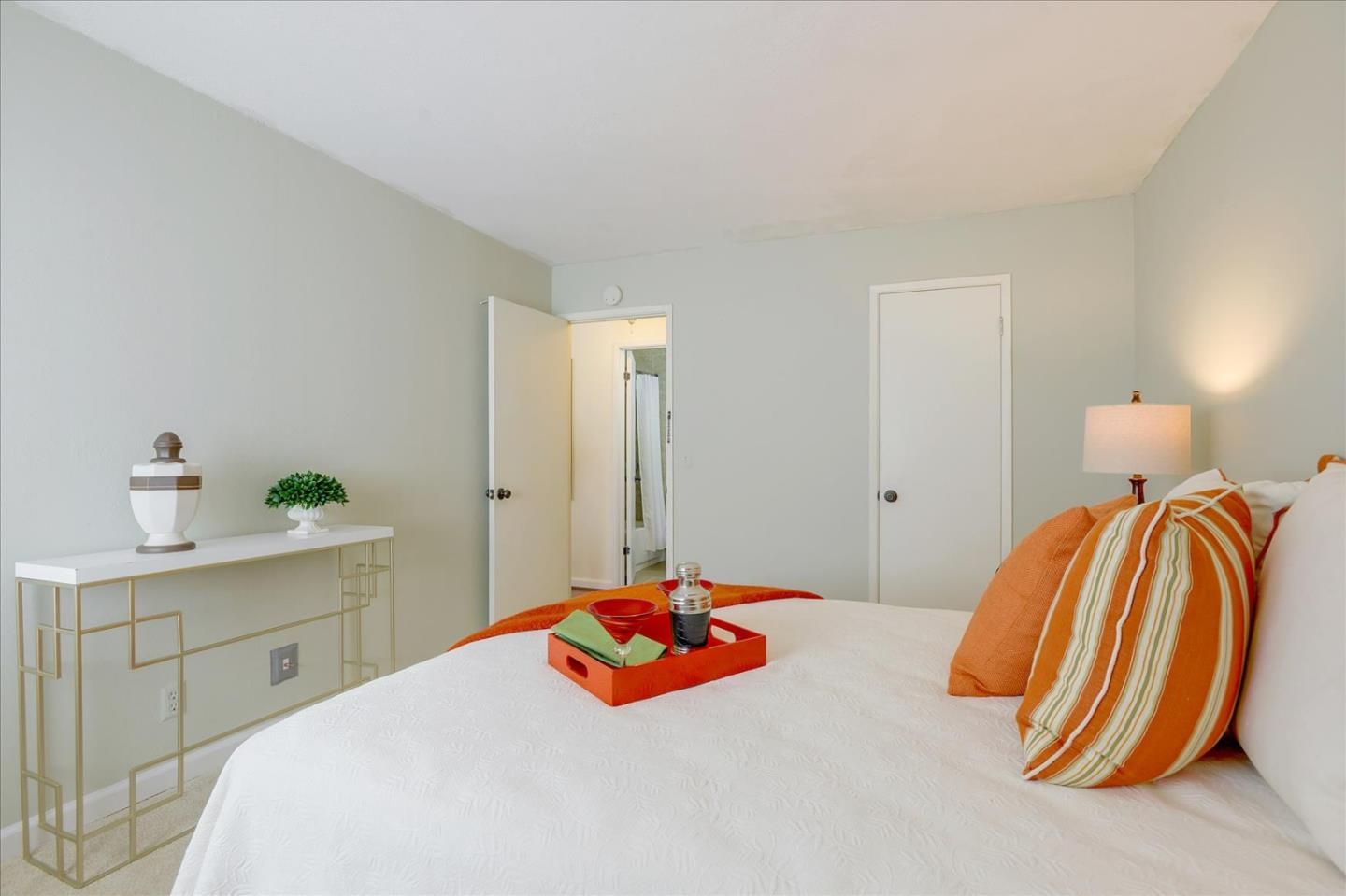 1033 Shell Boulevard, Unit 3 Foster City, CA 94404 - Photo 22 of 33 a bedroom with a bed and a desk