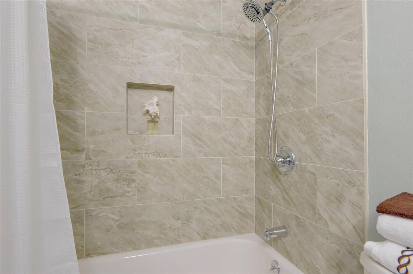 1033 Shell Boulevard, Unit 3 Foster City, CA 94404 - Photo 24 of 33 a bathroom with a shower and a toilet