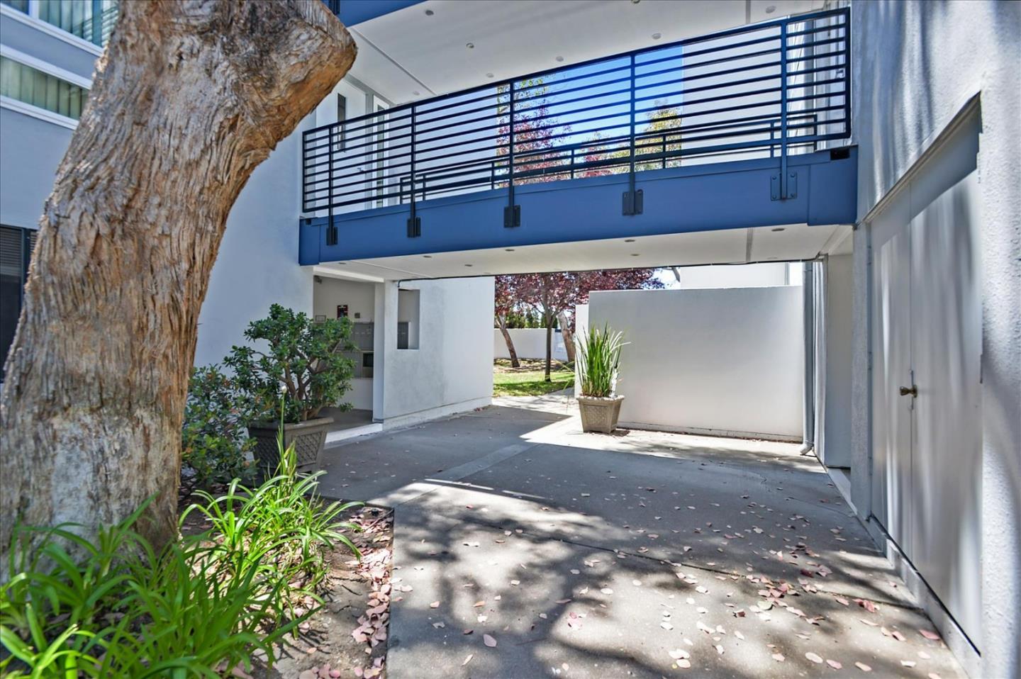 1033 Shell Boulevard, Unit 3 Foster City, CA 94404 - Photo 25 of 33 a view of a house with a garage