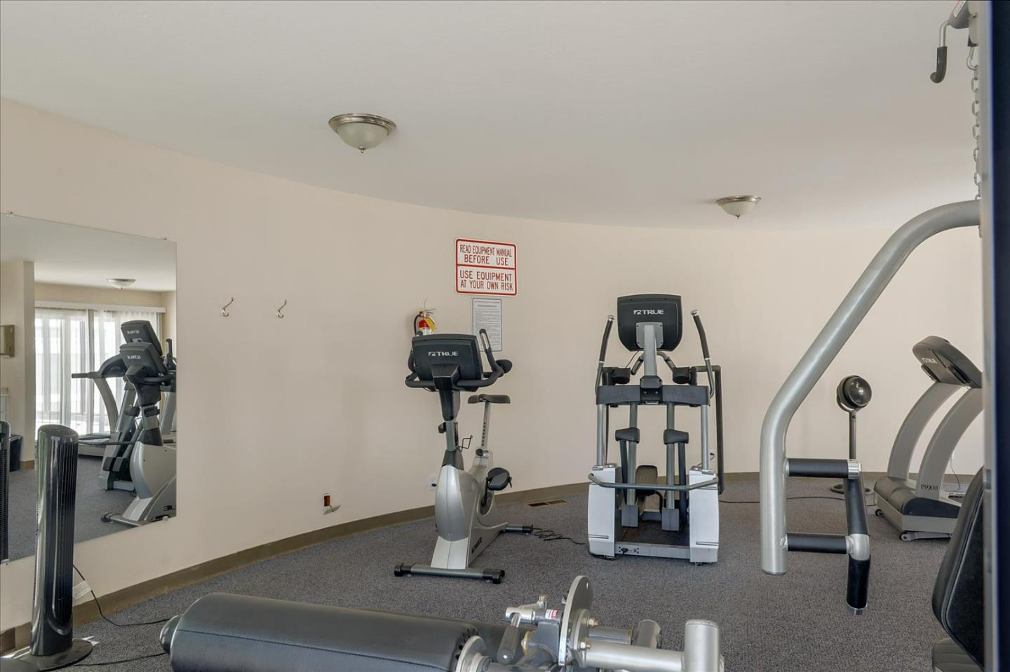 1033 Shell Boulevard, Unit 3 Foster City, CA 94404 - Photo 28 of 33 a room with gym equipment