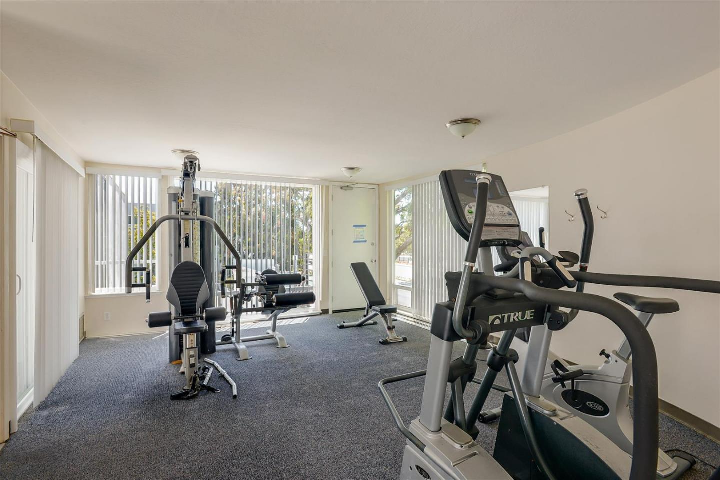 1033 Shell Boulevard, Unit 3 Foster City, CA 94404 - Photo 29 of 33 a view of a room with gym equipment