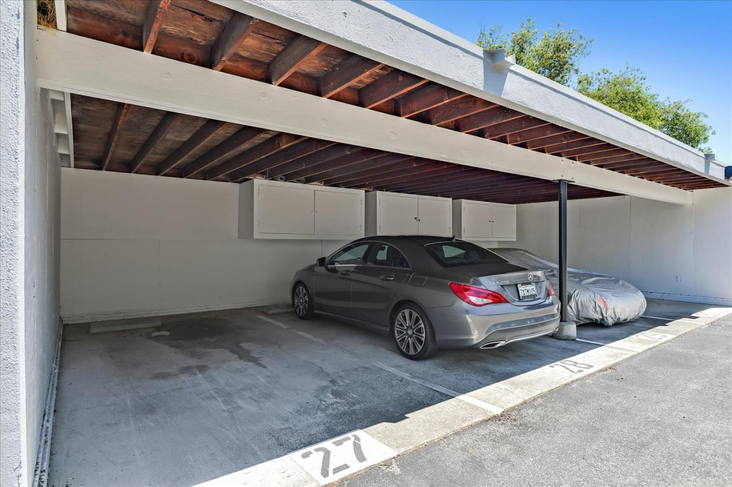 1033 Shell Boulevard, Unit 3 Foster City, CA 94404 - Photo 33 of 33 a car parked in front of a house