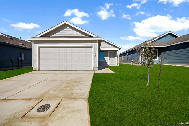 a front view of house with yard
