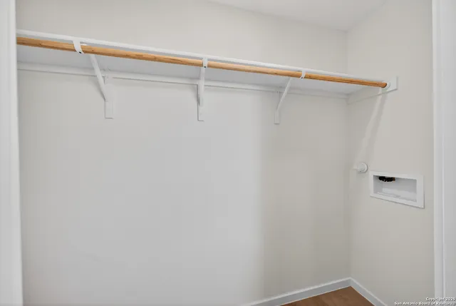 a view of small space with racks on the wall