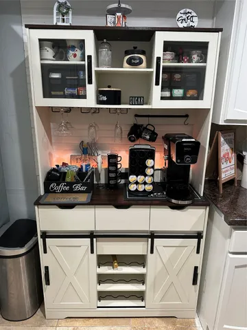 a kitchen with a stove and cabinets