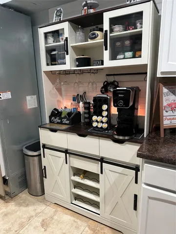a kitchen with a microwave and a stove