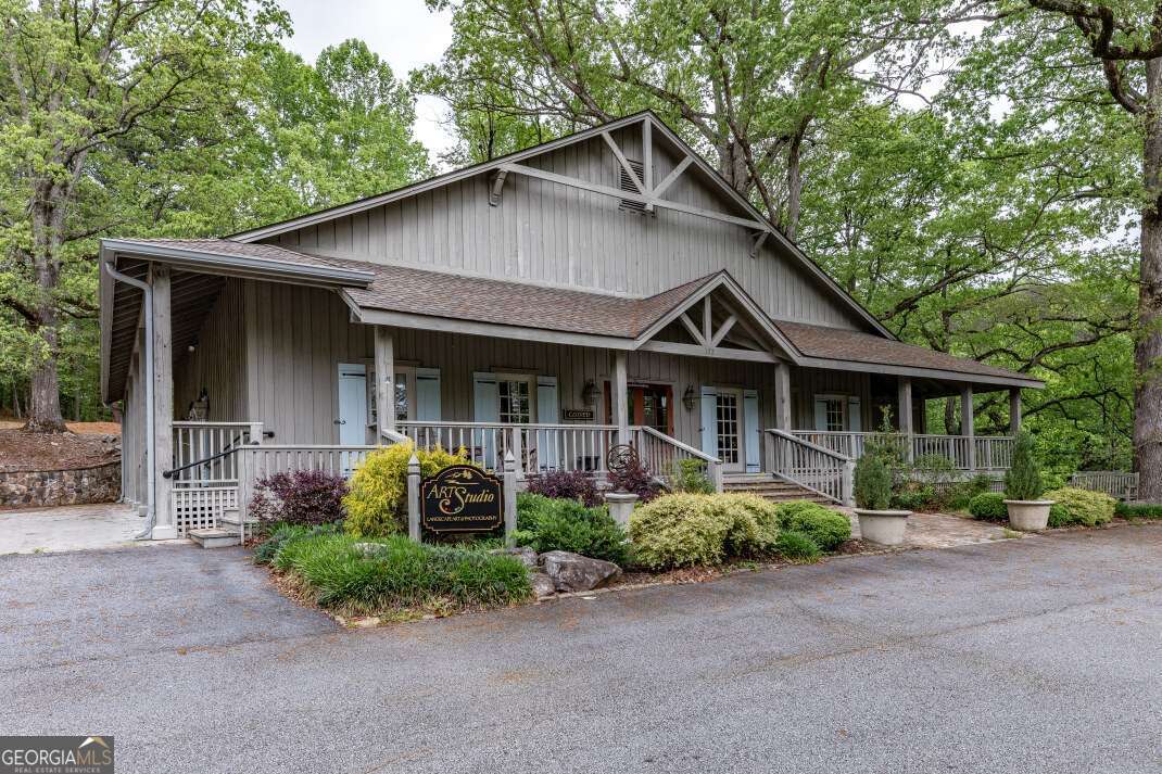 Lot 17 Lower Gap Road, Unit 17 Sautee Nacoochee, GA 30571 - Photo 31 of 39 a front view of a house with garden
