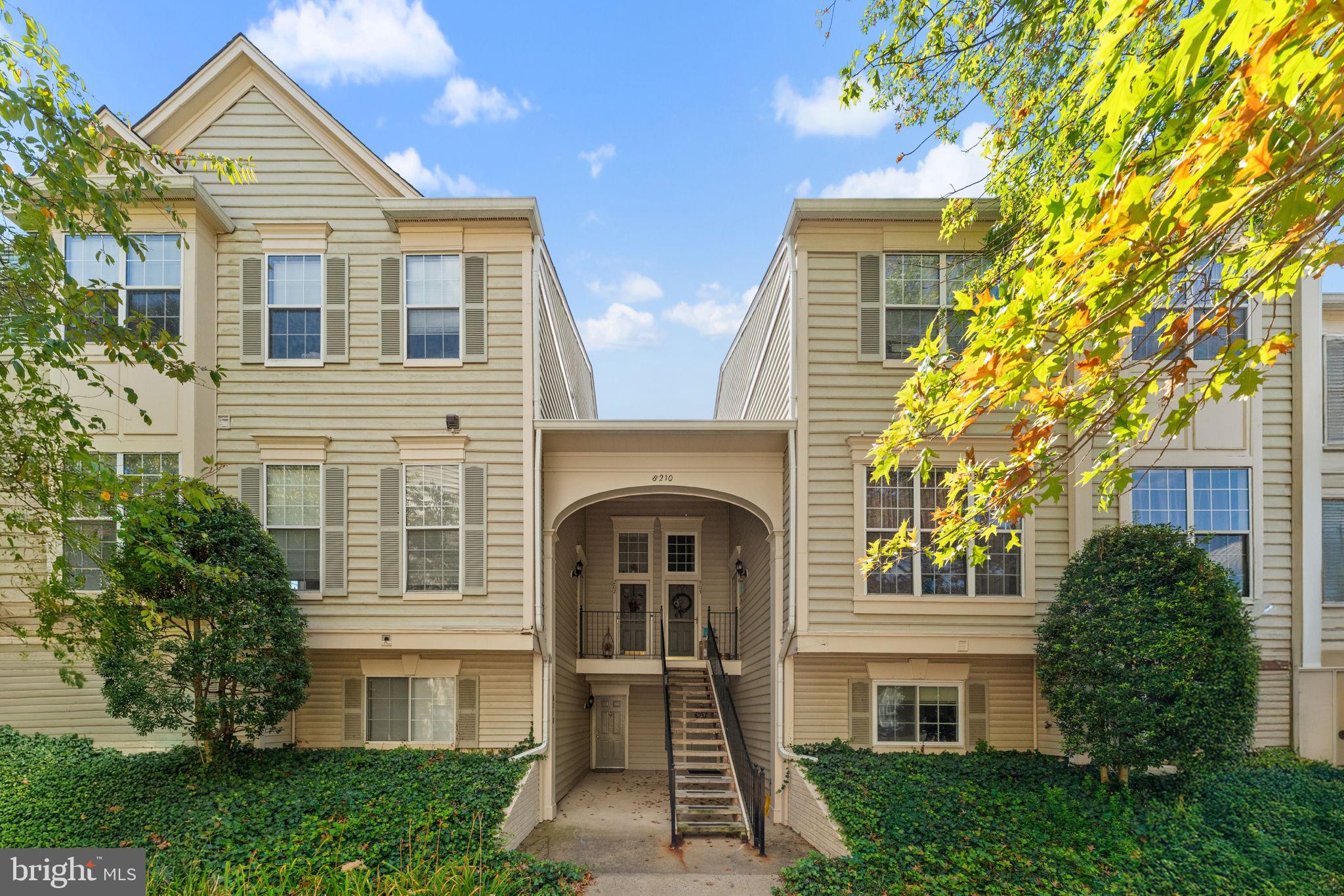 8210 Winstead Place Manassas, VA 20109 - Photo 2 of 27 a front view of a house with a yard