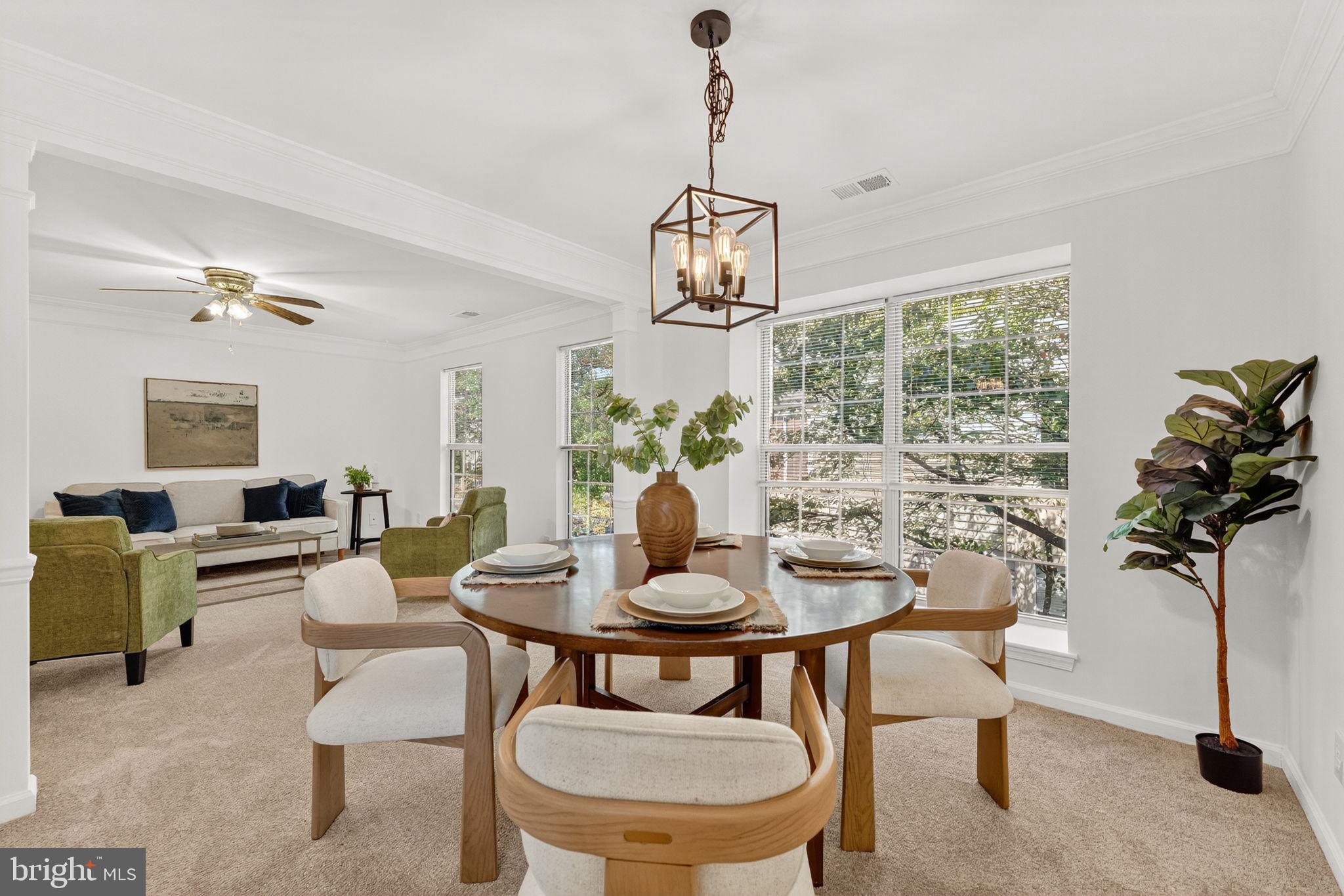 8210 Winstead Place Manassas, VA 20109 - Photo 4 of 27 a view of a dining room with furniture window and outside view
