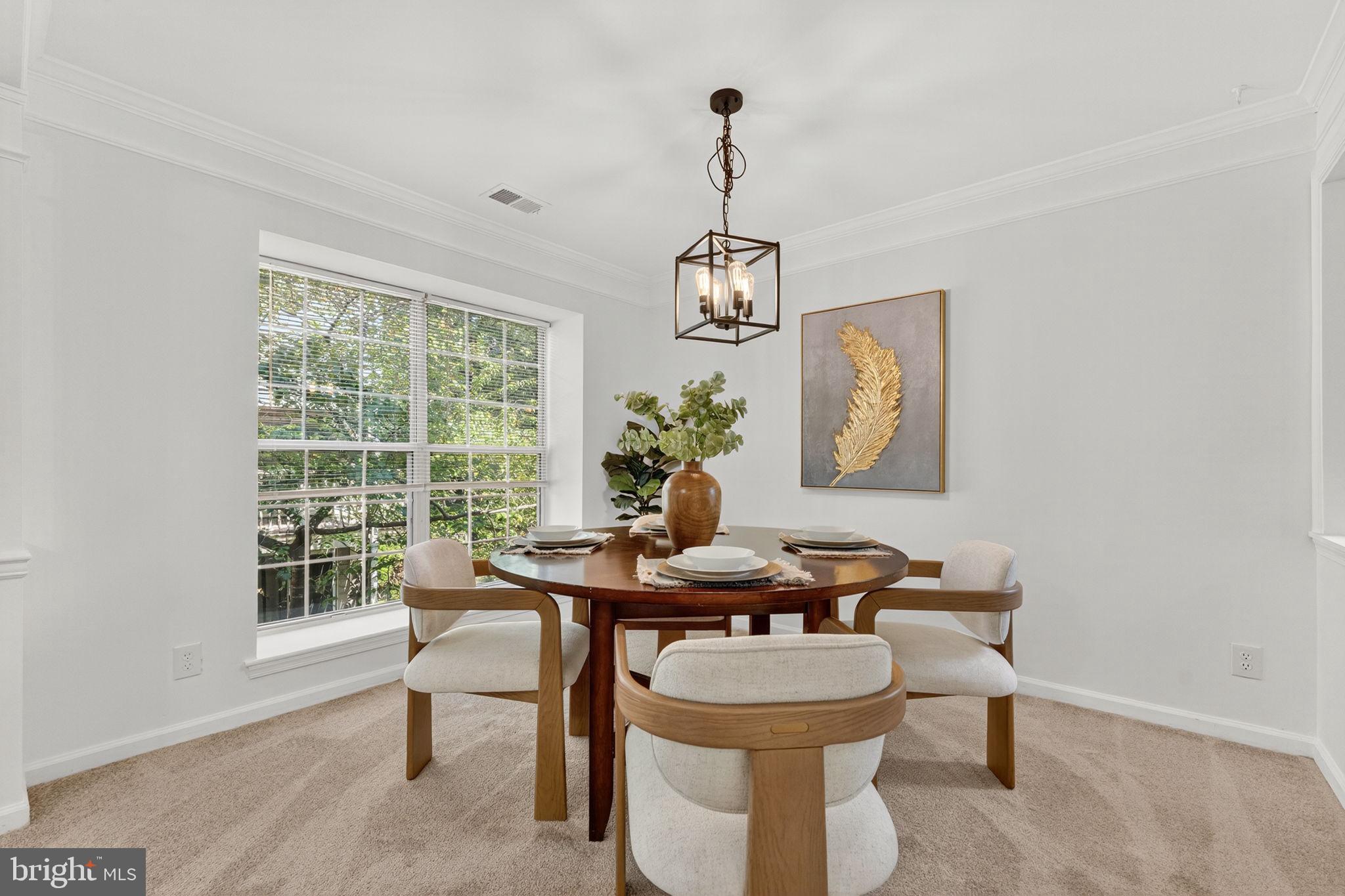 8210 Winstead Place Manassas, VA 20109 - Photo 6 of 27 a view of a dining room with furniture window and outside view