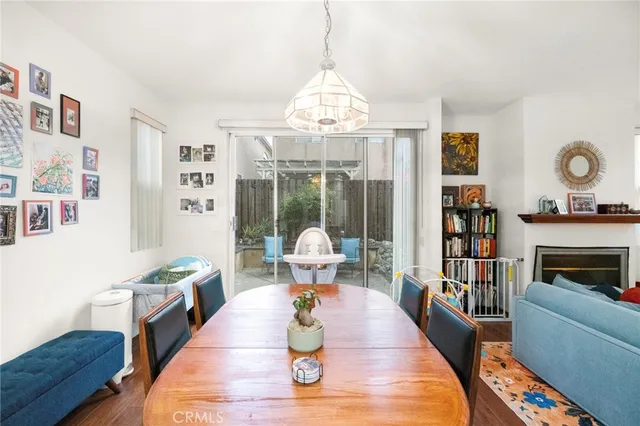 a kitchen with cabinets appliances a sink and a window