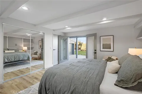 a en suite bathroom with a sink double vanity and a mirror