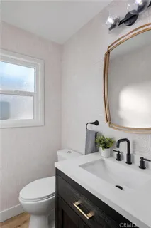a bathroom with a sink and a toilet