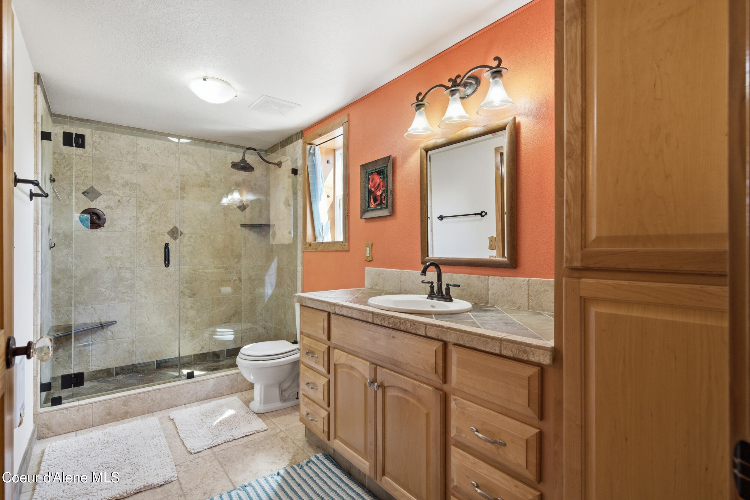 53 Sawtooth Way Sagle, ID 83860 - Photo 26 of 71 Tiled Primary Bath w Walkin Shower
