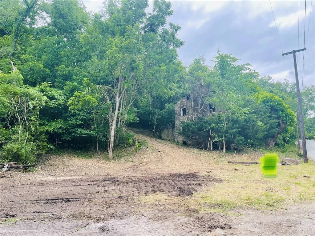 609 Laureldale Road Grindstone, PA 15442 - Photo 8 of 10 a backyard of a house with lots of green space