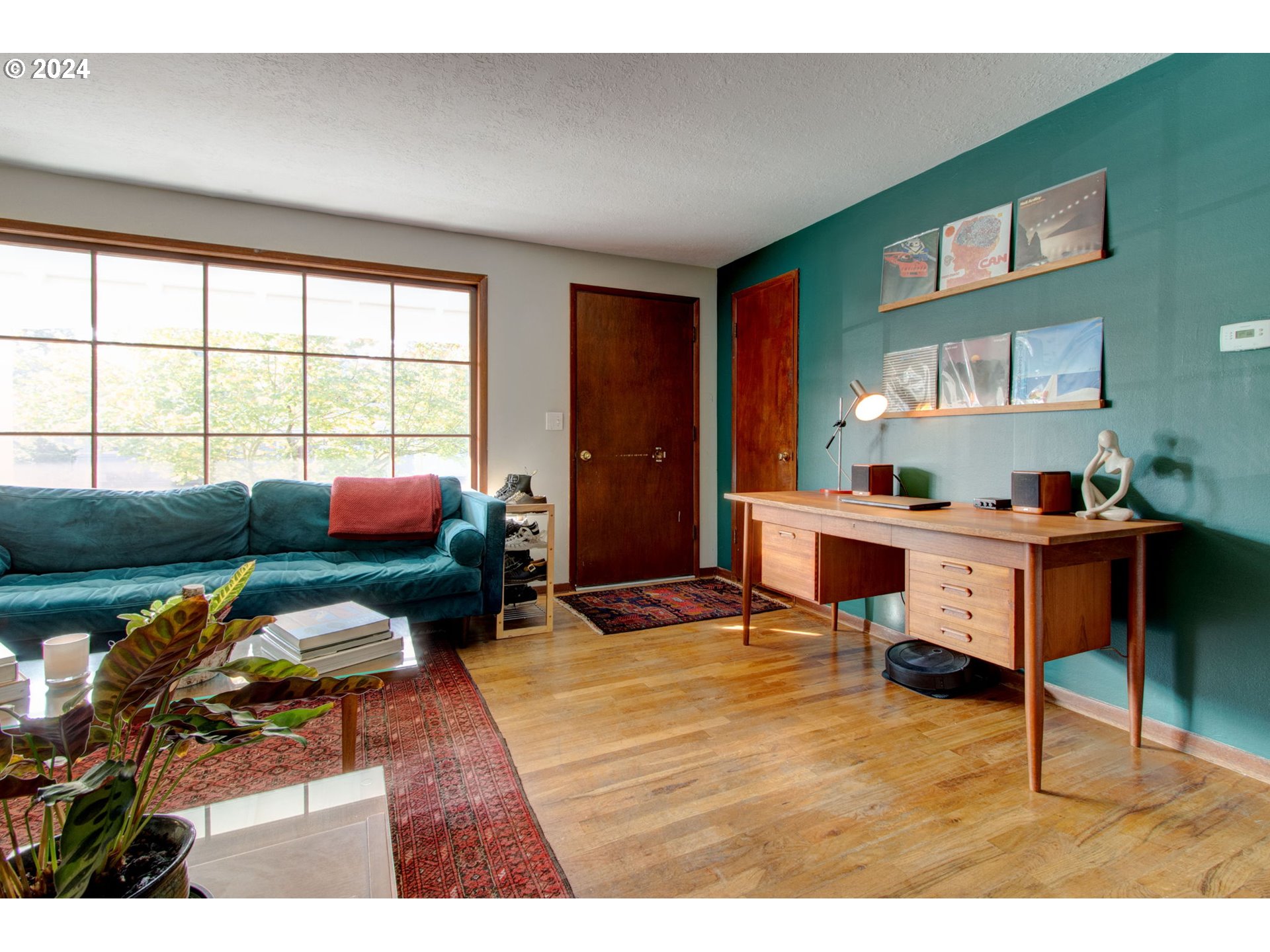 14205 Southeast Salmon Street Portland, OR 97233 - Photo 4 of 35 a living room with furniture and a window