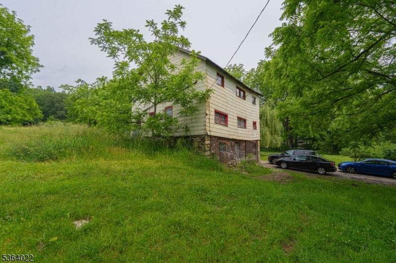 79 Mountain Lake Road Belvidere, NJ 07823 - Photo 13 of 47 a house view with a garden space