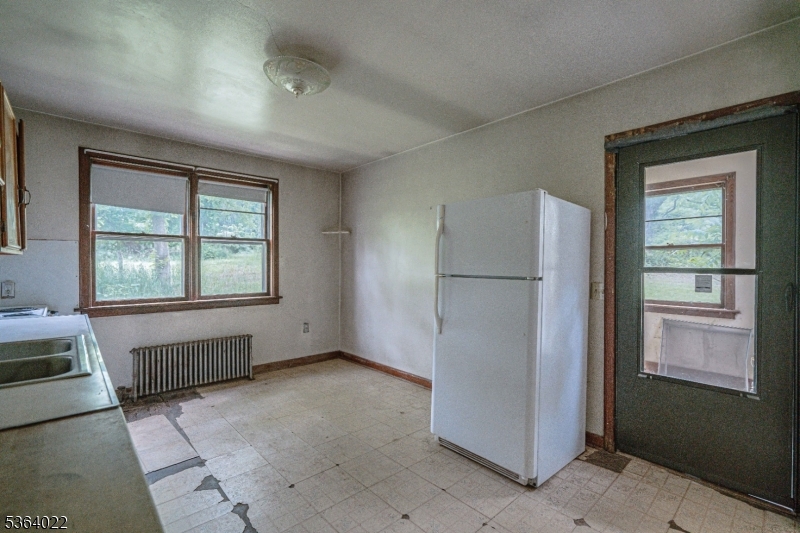 79 Mountain Lake Road Belvidere, NJ 07823 - Photo 21 of 47 a view of an empty room with a window