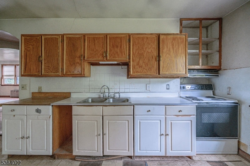 79 Mountain Lake Road Belvidere, NJ 07823 - Photo 24 of 47 a kitchen with granite countertop a sink and cabinets