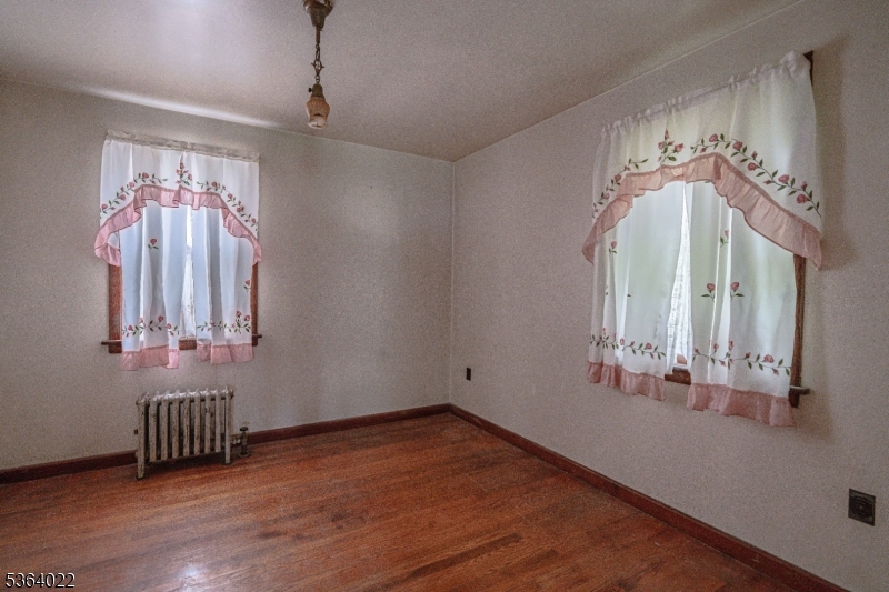 79 Mountain Lake Road Belvidere, NJ 07823 - Photo 32 of 47 wooden floor in an empty room with a window