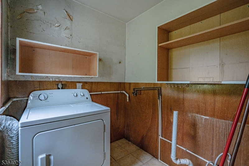 79 Mountain Lake Road Belvidere, NJ 07823 - Photo 34 of 47 a utility room with dryer and washer