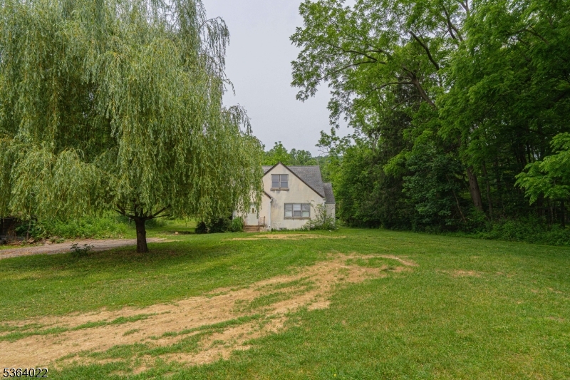 79 Mountain Lake Road Belvidere, NJ 07823 - Photo 4 of 47 a front view of a house with a yard
