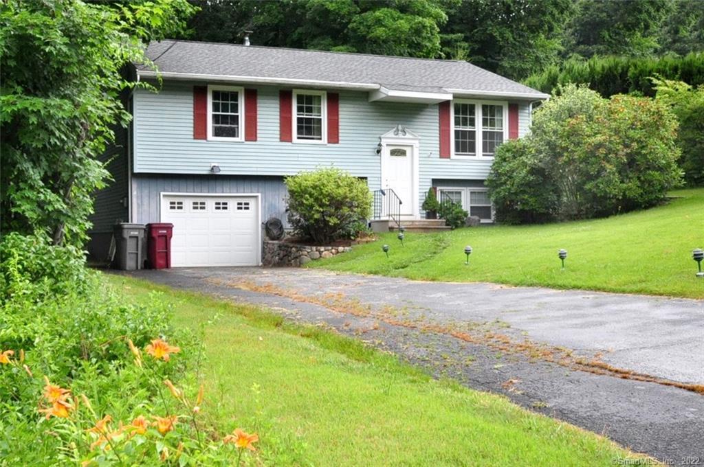 Great level driveway and only a few stairs provides easy access to home