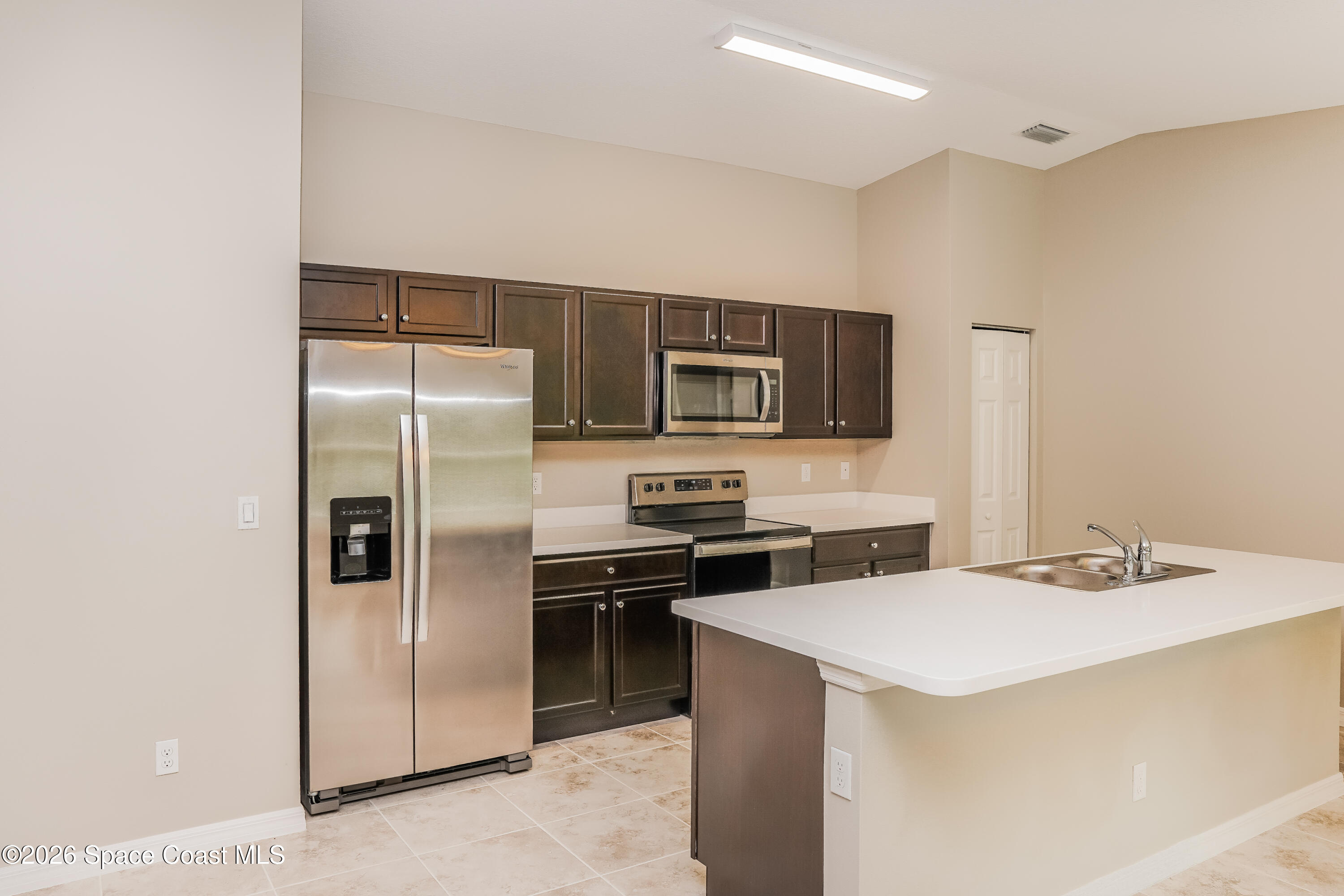 418 La Croix Road Southwest Palm Bay, FL 32908 - Photo 4 of 15 1001481.418 La Croix Road SW - Kitchen_1