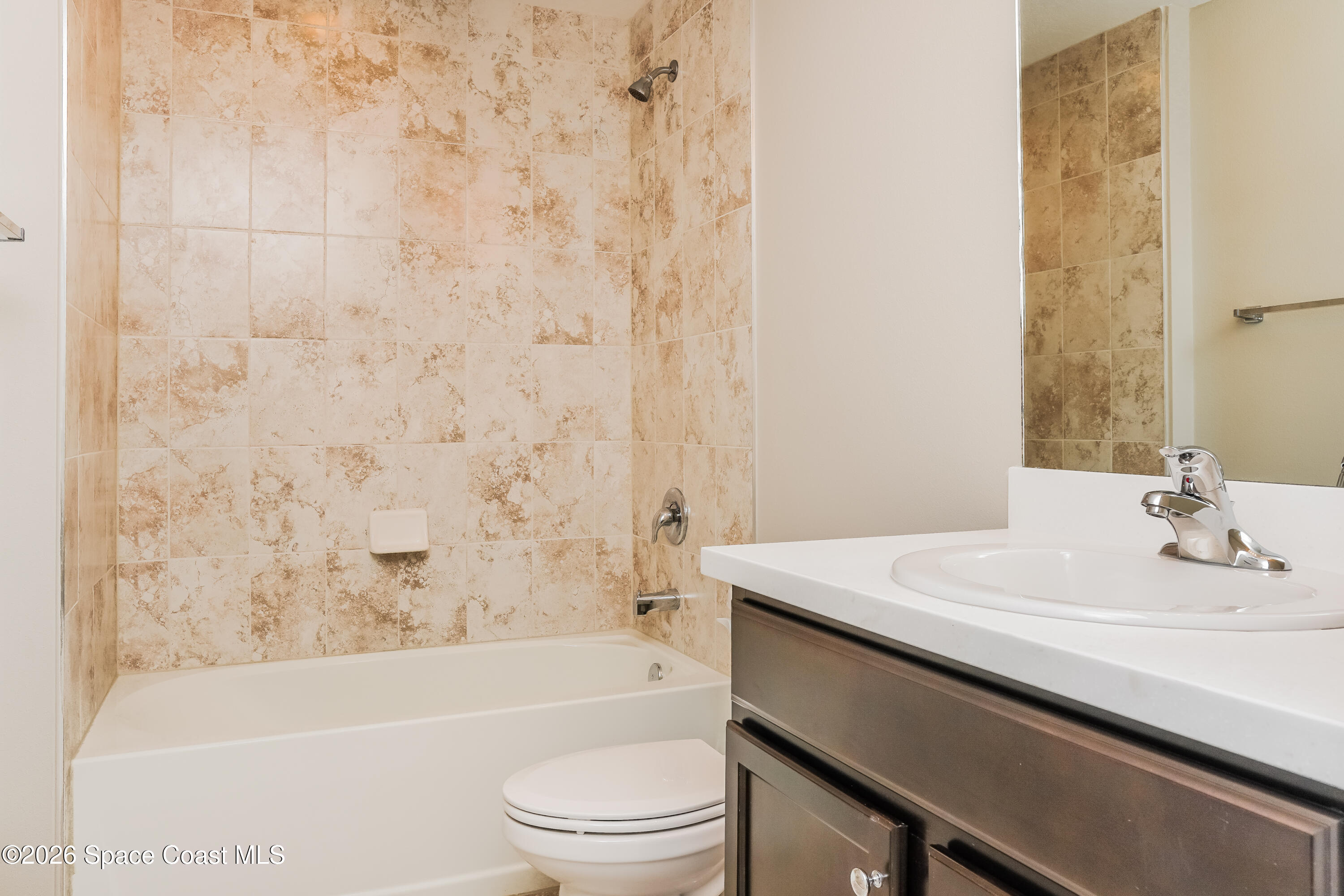 418 La Croix Road Southwest Palm Bay, FL 32908 - Photo 8 of 15 1001481.418 La Croix Road SW - Bathroom