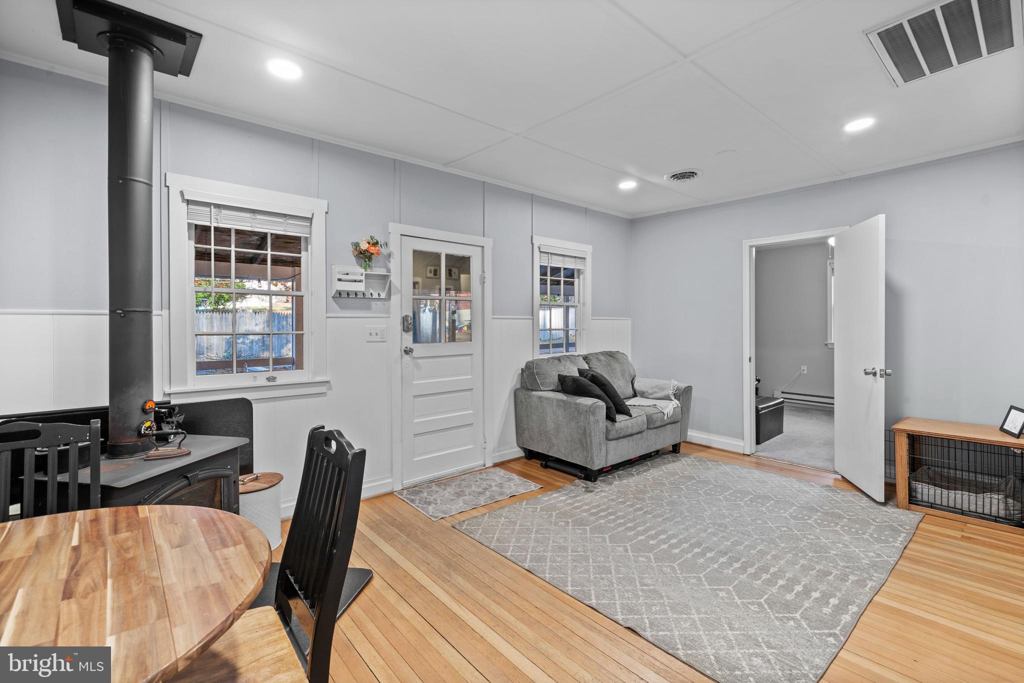 6015 Poplar Road St. Leonard, MD 20685 - Photo 11 of 35 a bedroom with furniture and a wooden floor