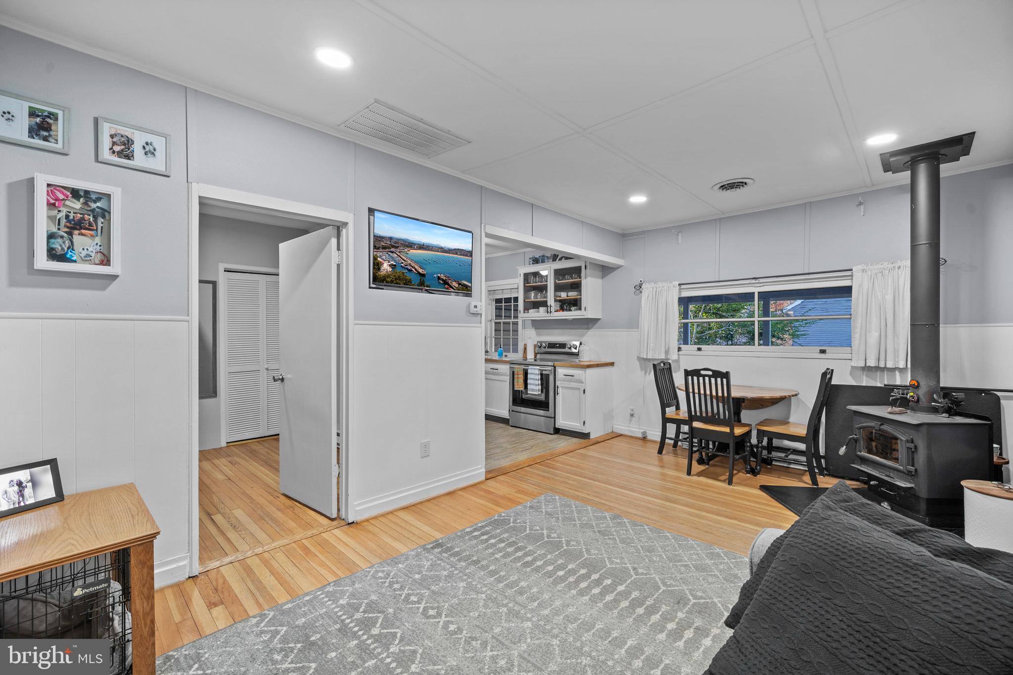 6015 Poplar Road St. Leonard, MD 20685 - Photo 12 of 35 a living room with furniture rug and window