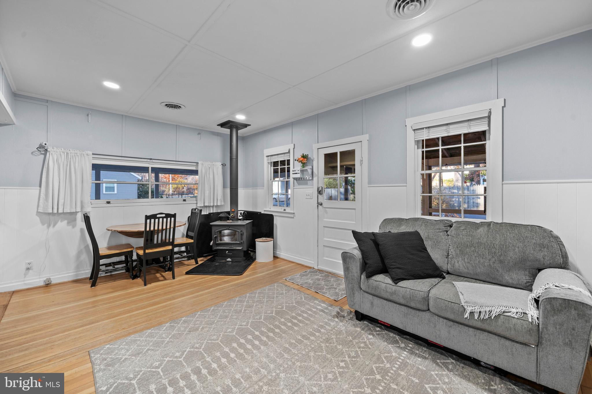 6015 Poplar Road St. Leonard, MD 20685 - Photo 14 of 35 a living room with furniture and a large window