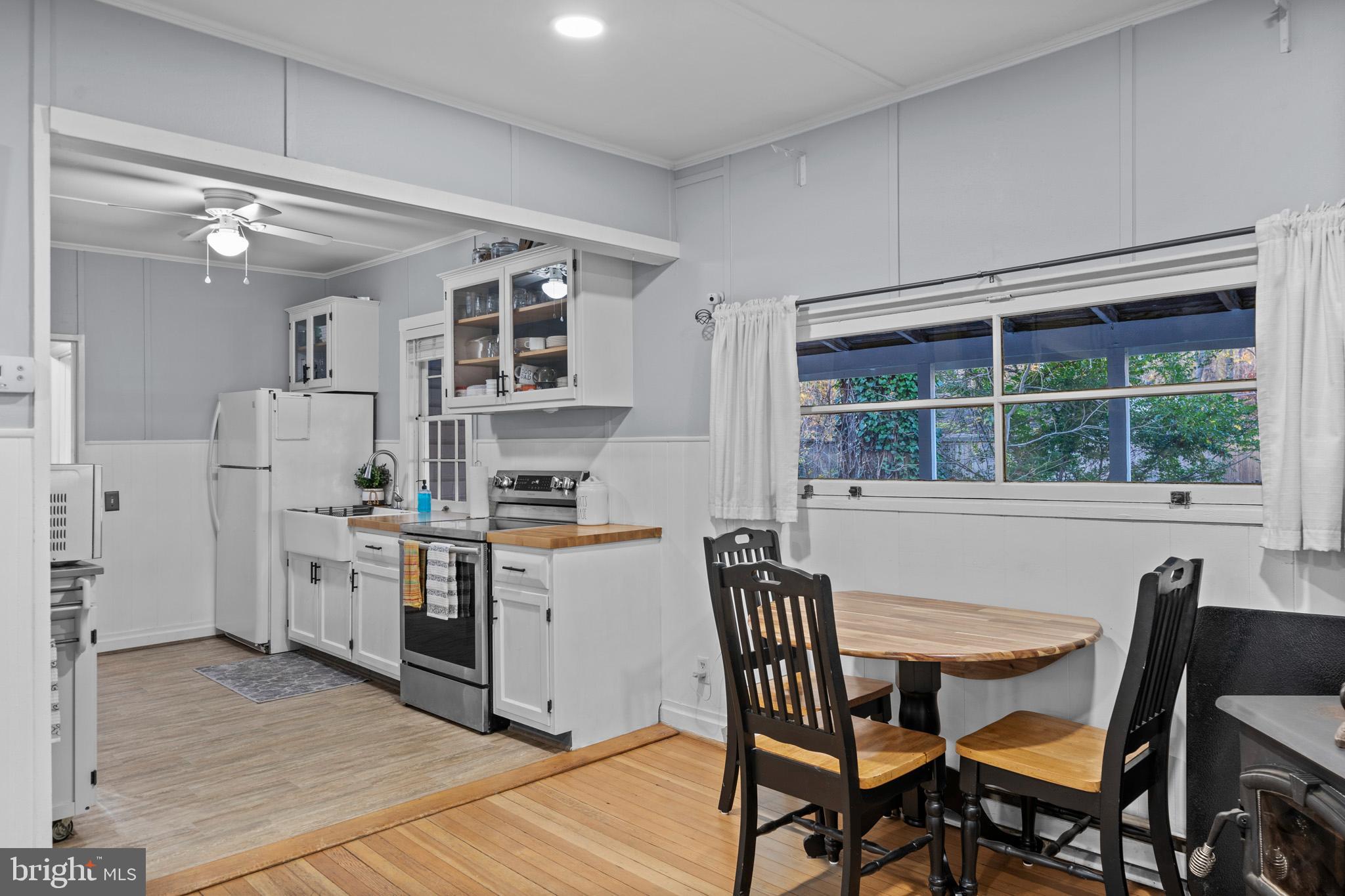 6015 Poplar Road St. Leonard, MD 20685 - Photo 17 of 35 a kitchen that has a cabinets counter space and appliances in it