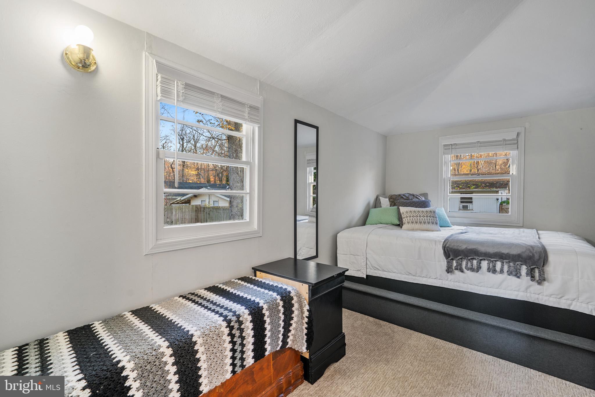 6015 Poplar Road St. Leonard, MD 20685 - Photo 24 of 35 a bedroom with a bed and a window