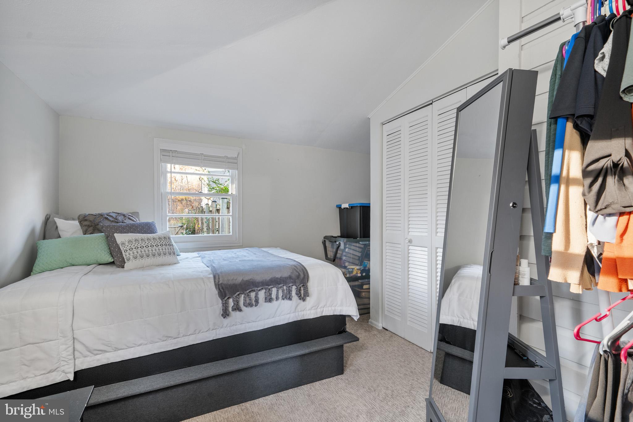 6015 Poplar Road St. Leonard, MD 20685 - Photo 25 of 35 a bedroom with a bed and a window