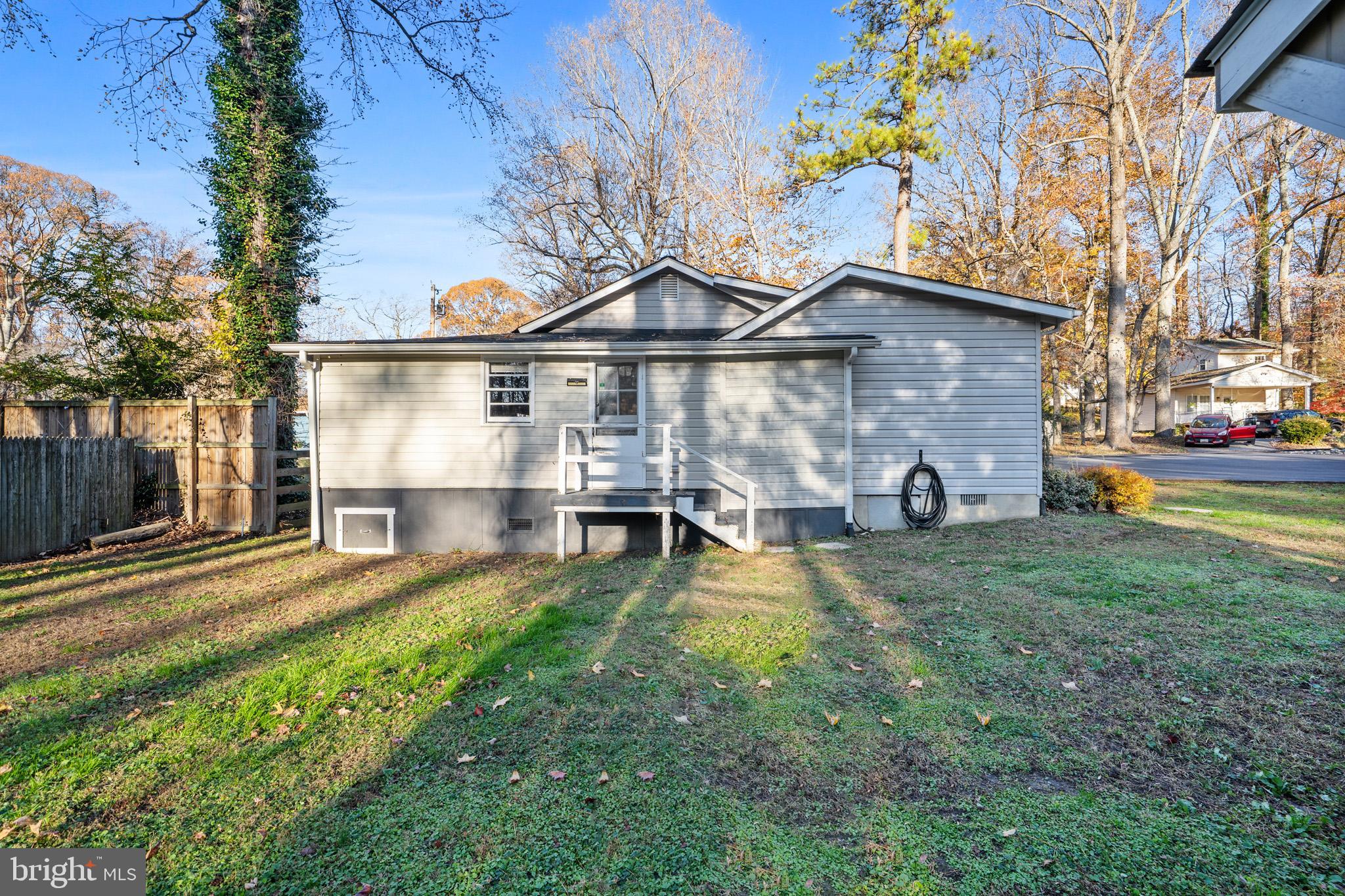 6015 Poplar Road St. Leonard, MD 20685 - Photo 35 of 35 a view of a house with a yard