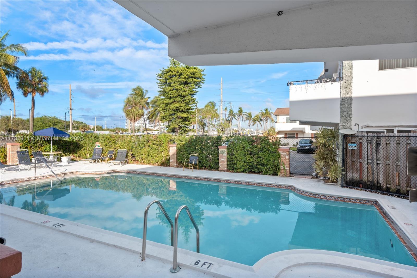 222 Southwest 1st Street, Unit H6 Pompano Beach, FL 33060 - Photo 1 of 15 a view of a swimming pool