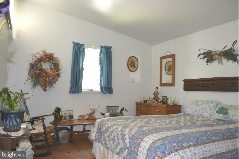801 Racine School Road Elkton, MD 21921 - Photo 18 of 30 Bedroom - Cathedral Ceiling - Pine Plank Flooring